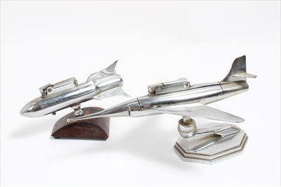 Lot 1920 - Two vintage chrome lighters, one in the form of a missile and the other a jet