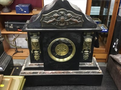 Lot 138 - Late Victorian black slate mantel clock of large proportions, architectural form, with applied gilt metal mounts and circular dial with exposed anchor escapement (keys and pendulum present), 51cm h...