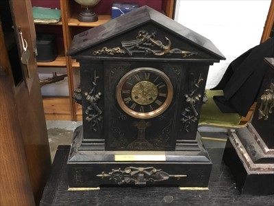 Lot 137 - Late 19th century mantel clock with French eight day movement, signed - G. R., striking on a gong, brass dial with black chapter ring and Roman numerals, in an impressive black slate case of archit...
