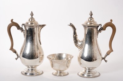 Lot 223 - Georgian style silver coffee pot, matching hot water pot and sugar bowl