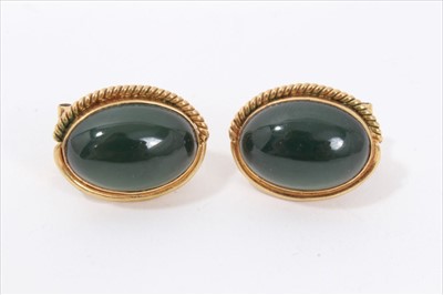 Lot 142 - Pair of 18ct gold green hardstone cabochon earrings