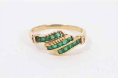 Lot 143 - 18ct gold emerald and diamond ring