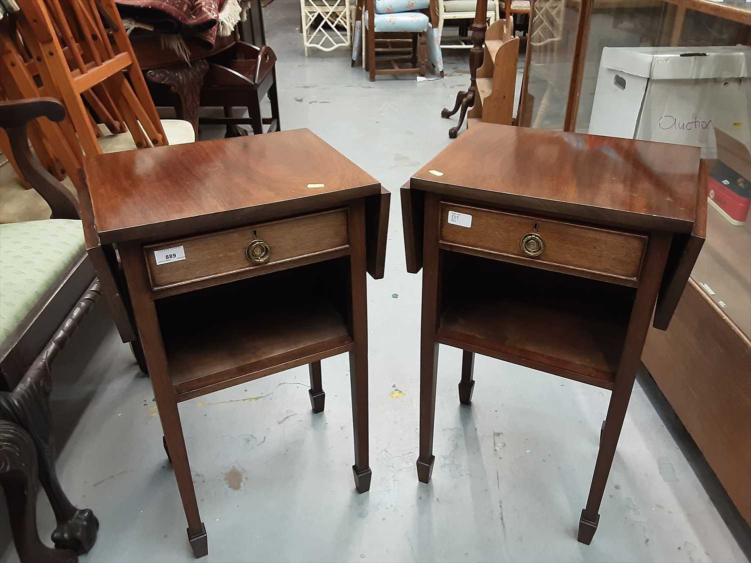 Lot 889 - Pair of mahogany bedside tables