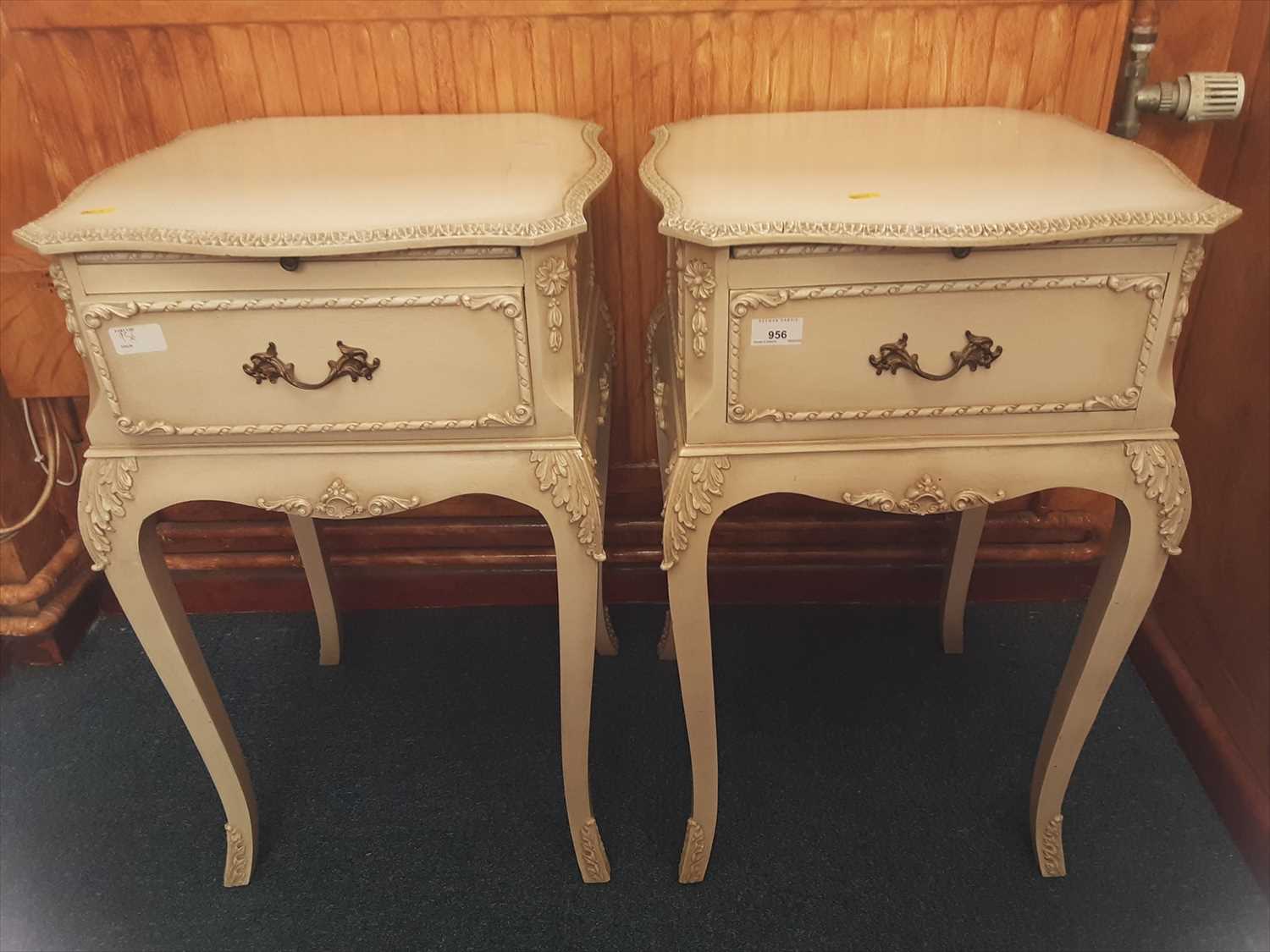 Lot 956 - Pair of French style cream painted bedside tables