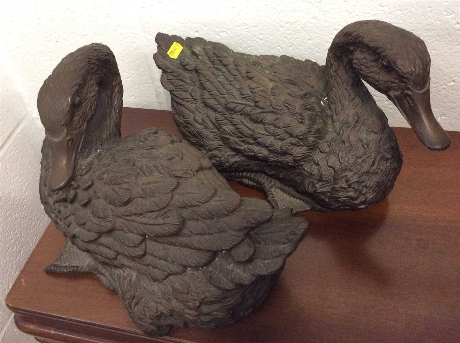 Lot 16 - Pair of bronzed resin figures of ducks