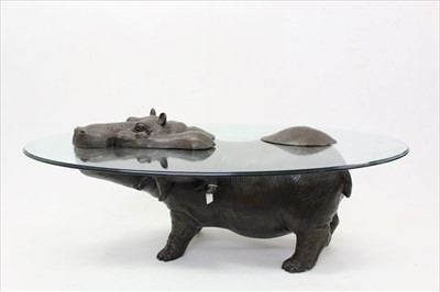 Lot 1975 - Contemporary Bronze 'Hippo' coffee table by Mark Stoddart, the bronze depicting a mother and calf partially 'submerged' under the glass oval top.