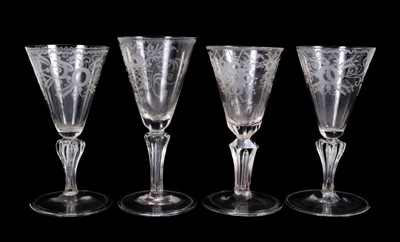 Lot 45 - Group of four 18th century continental wine glasses, with etched bowls, Silesian stems and folded feet