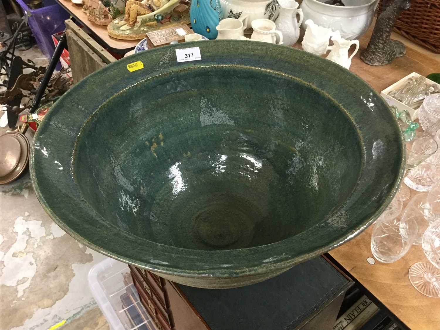 Lot 317 - Green irredescent glazed art pottery bowl