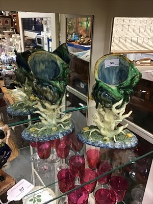 Lot 53 - Pair of novelty Victorian majolica glazed vases in the form of shells supported from coral formed stems