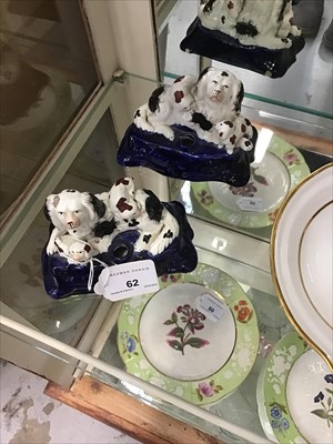 Lot 62 - Pair of late Victorian Staffordshire inkwells in the form of spaniels and puppies
