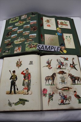 Lot 1107 - Two Victorian Scrap Books containing scraps large and small including Royalty and other known people, military, stage coach, firemen, animals, insects, flowers etc. Also greeting cards.