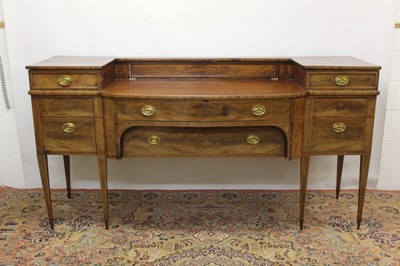 Lot 1386 - George III mahogany and line inlaid bowfront sideboard