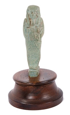 Lot 720 - Ancient Egyptian celadon glazed ushabti, wooden mount
