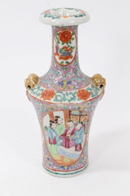 Lot 41 - 19th century Chinese famille rose Canton porcelain vase, decorated with panels of figures and flowers, on a lilac ground, with mask and ring handles, 20.5cm height