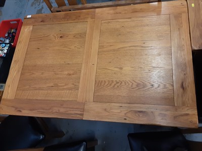 Lot 950 - Light oak extending dining table and six chairs