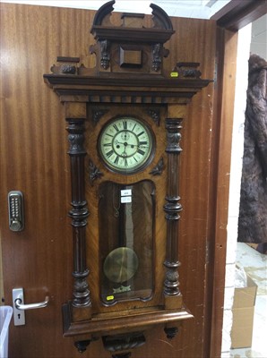 Lot 414 - Large walnut veneer regulator wall clock