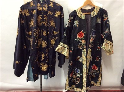 Lot 1662 - Two Chinese embroidered silk robes.