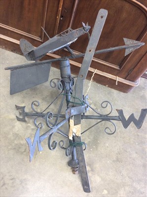 Lot 420 - Wrought iron weather vain with Hurricane Bomber surmount, brass wall mounted bell and watering can