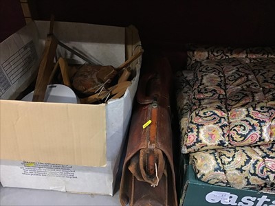 Lot 540 - Box of wooden coat hangers and shoe stretchers, leather brief case and textiles