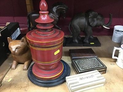 Lot 545 - Wooden urn, treen cat, horse, elephant book ends and boxes