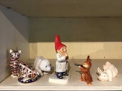 Lot 238 - Two Royal Crown Derby porcelain paperweights, Royal Copenhagen polar bear cub 535, Beswick pig and piglet, and two Goebel ornaments