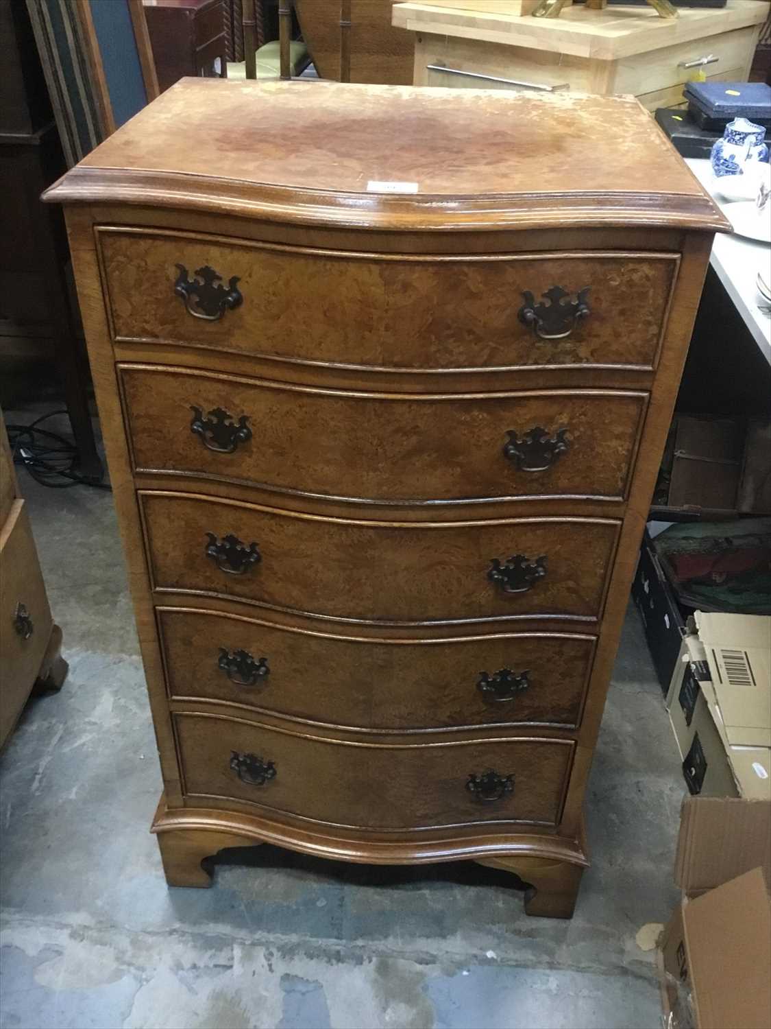 Lot 992 - Queen Anne -style walnut serpentine chest with five graduated drawers on bracket feet