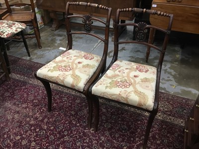 Lot 141 - Pair of Regency sabre-leg chairs