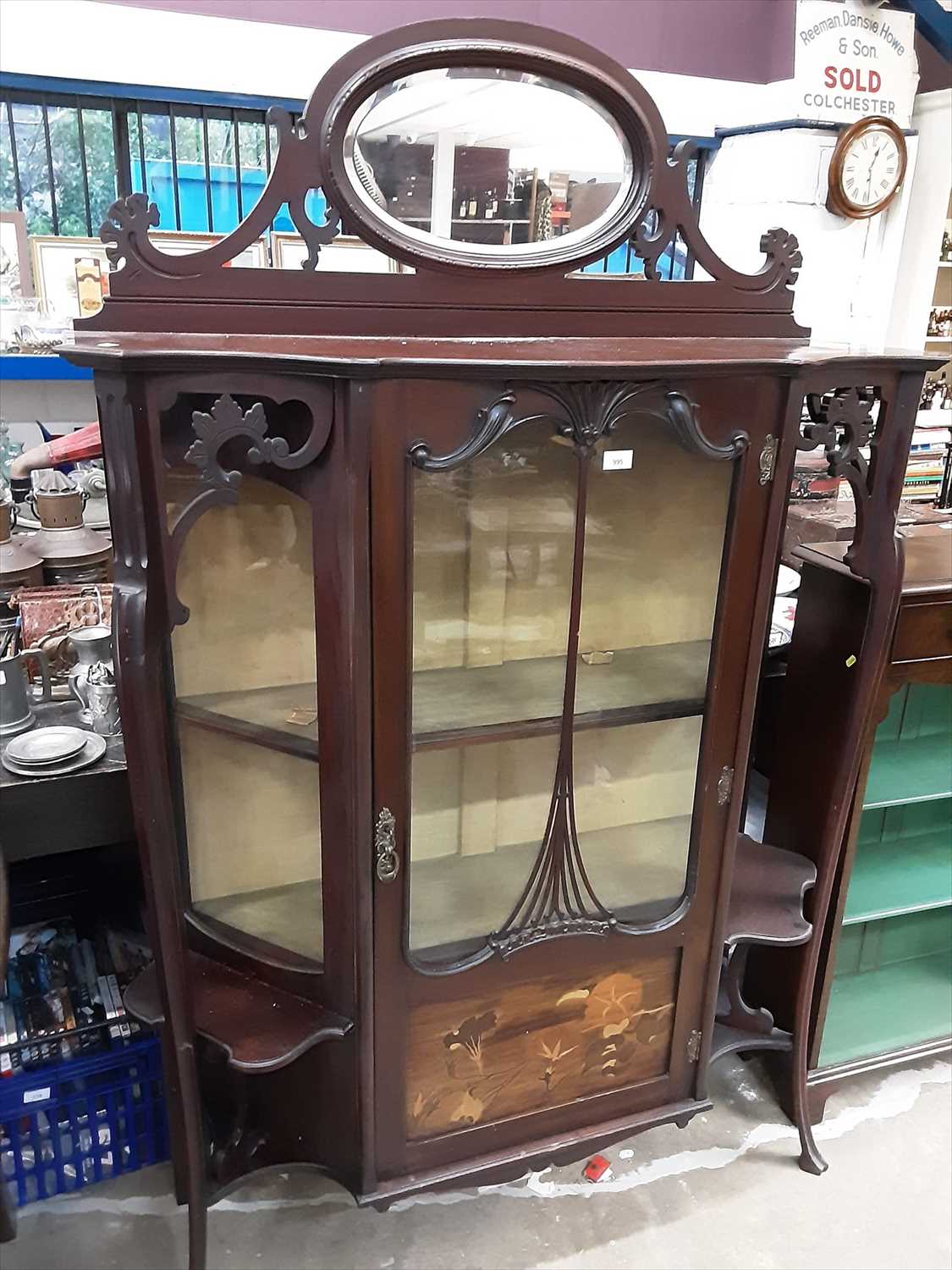 Lot 995 - Edwardian mahogany display cabinet with shelved interior enclosed by glazed and panelled door