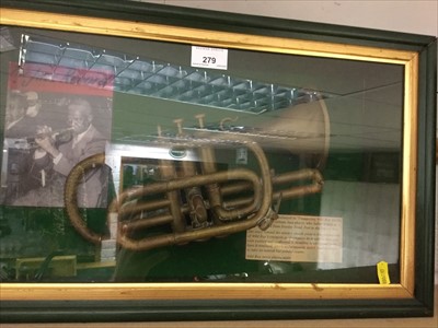 Lot 279 - Trumpet in case, believed to belong to 'Trumpeting Wild Boy Quirk' together with a treasure chest fruit machine (2)