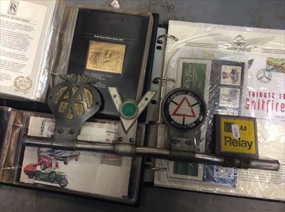 Lot 284 - AA badge and other car badges on bar, together with car related a First Day covers