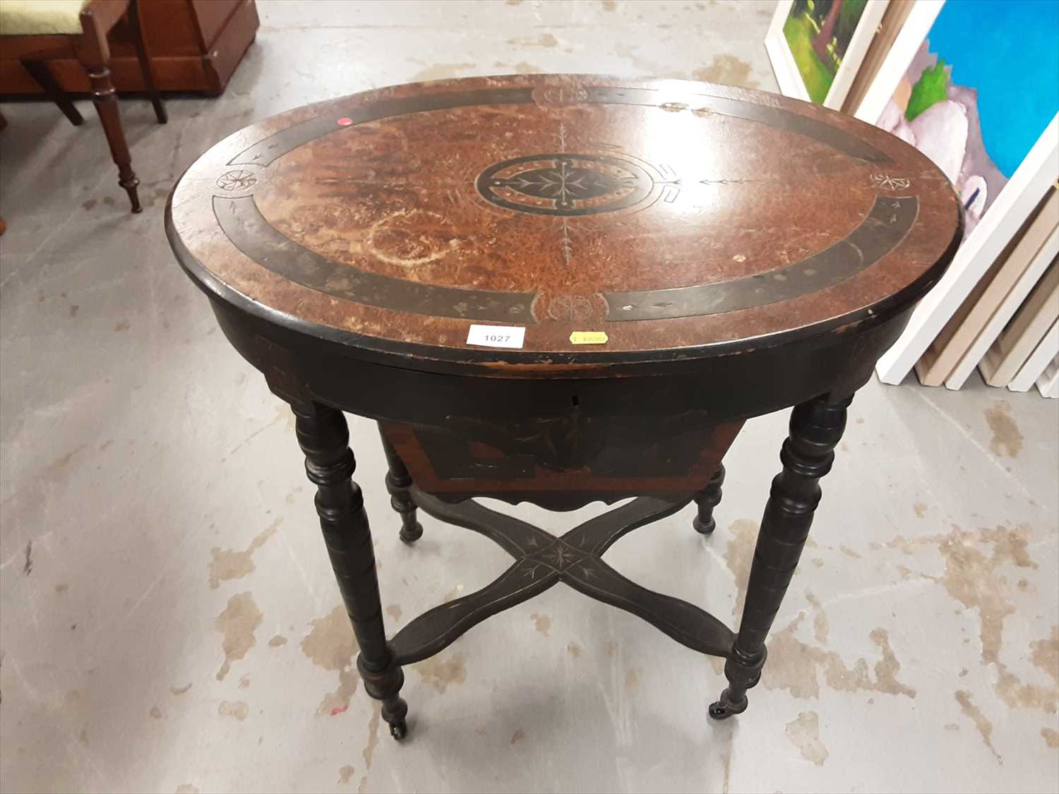 Lot 1027 - Victorian ebonised and burr walnut oval sewing table on ring turned legs joined by stretchers