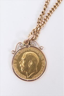 Lot 130 - George V gold half sovereign, 1911, in pendant mount on 9ct gold chain