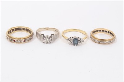 Lot 133 - Four 18ct gold gem set dress rings