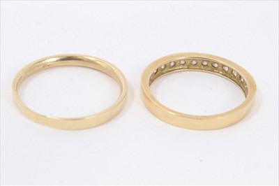 Lot 134 - Two 18ct gold diamond set half eternity rings