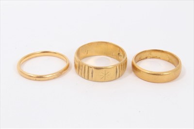 Lot 135 - Three 22ct gold wedding rings