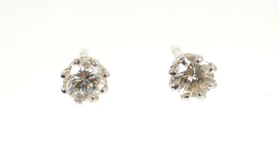 Lot 439 - Pair of diamond single stone earrings estimated total diamond weight approximately 0.50cts