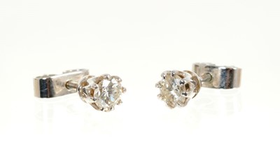 Lot 439 - Pair of diamond single stone earrings estimated total diamond weight approximately 0.50cts