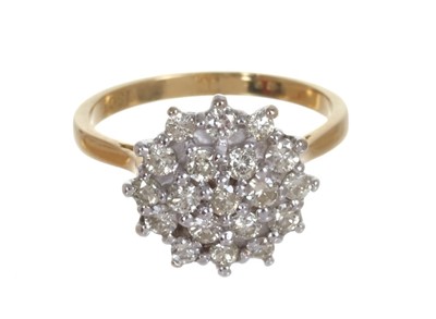 Lot 441 - Diamond cluster ring with a round cluster of 19 brilliant cut diamonds in tiered claw setting on 18ct yellow gold shank. Estimated total diamond weight approximately 0.50ct.