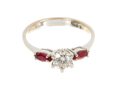 Lot 443 - Diamond and ruby three stone ring with a central brilliant cut diamond estimated to weigh approximately 0.50cts flanked by two marquise cut rubies on 18ct white gold shank