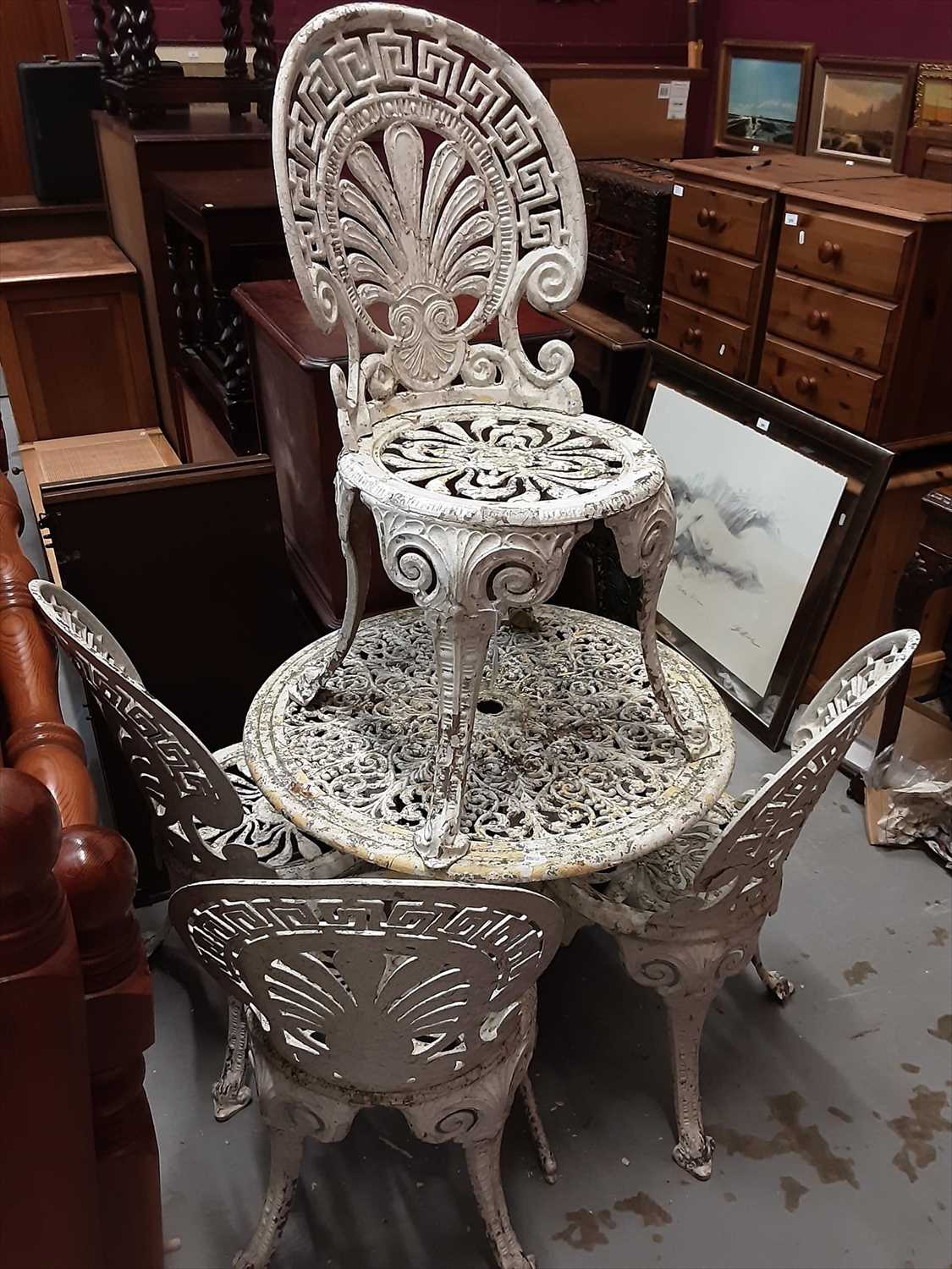 Lot 1053 - Wrought iron circular garden table and set