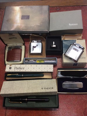 Lot 498 - Silver plated cigar box, group lighters and Parker pens