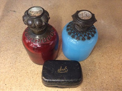 Lot 106 - Two antique coloured glass scent bottles with hand painted buildings to tops, together with a travelling ink well