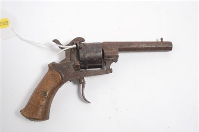 Lot 823 - Antique Pin Fire Revolver with wood grip
