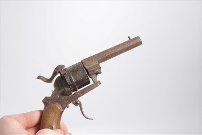 Lot 823 - Antique Pin Fire Revolver with wood grip