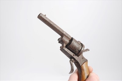 Lot 823 - Antique Pin Fire Revolver with wood grip