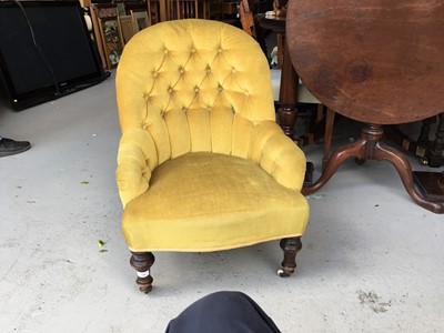 Lot 108 - Victorian nursing chair with buttoned back golden velvet upholstery on turned legs with ceramic castors, 74cm in overall height