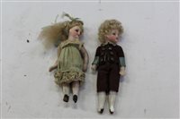 Lot 2838 - Two antique doll house dolls - bisque heads -...