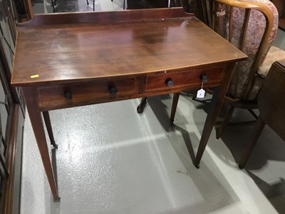 Lot 146 - Mahogany inlaid side table with ledge back and two draws below, on square taper legs with brass castors