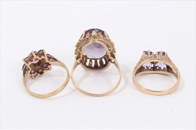 Lot 172 - Three 9ct gold amethyst dress rings
