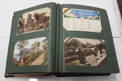 Lot 1140 - Postcards in two albums including GB topography